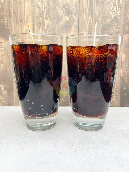Cola pop candle. Gel Wax in Clear Tall candle glass mimicking a glass of cola pop.