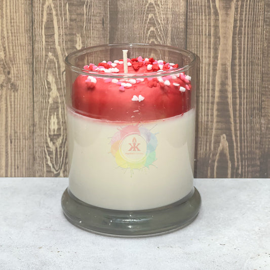 Photo of donut candle. Wax Donut sitting in glass. 